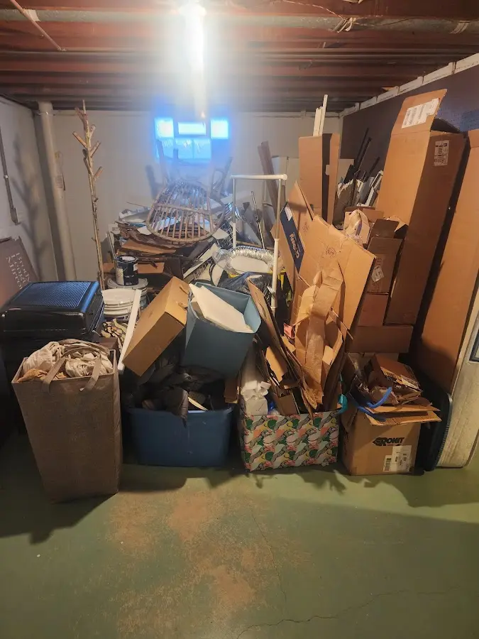 Roll-off dumpster container at job site for Construction Dumpster Rental in Garner